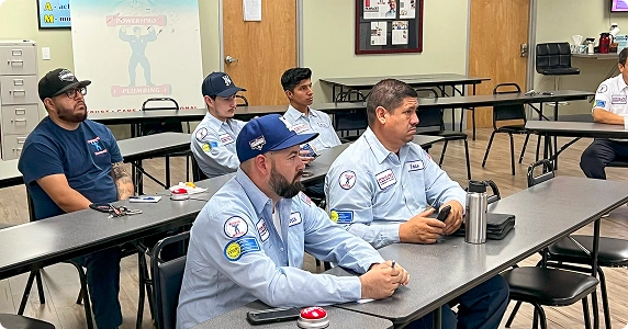 Power Pro technicians in weekly training